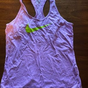 Purple Nike tank top with lime green Nike sign - size large